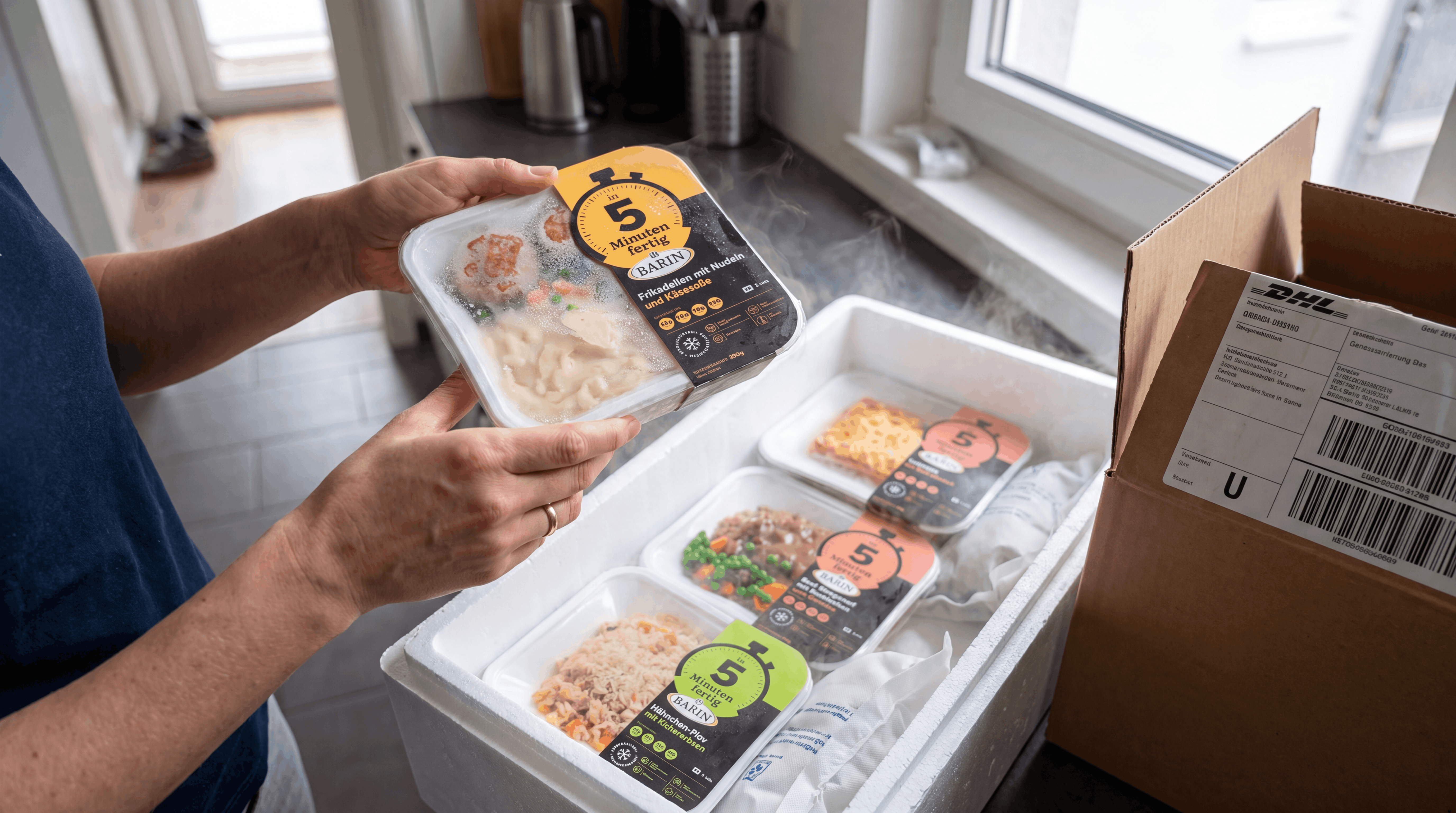 Geöffnete BARIN Thermobox mit tiefgekühlten Fertiggerichten